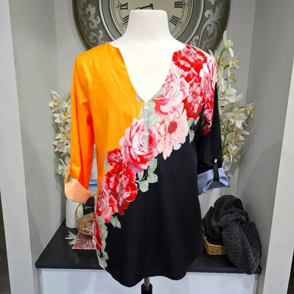 Embrace Bold Style with This Eye-Catching Floral Top - Picture 1 of 7